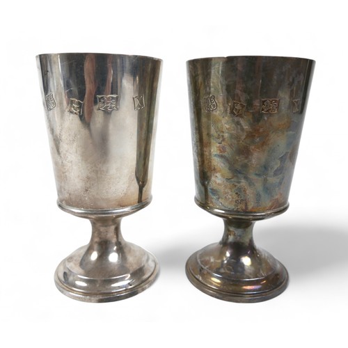 125 - A pair of silver gilt goblets, Birmingham marked BES Co for Barker Ellis Silver Co, each engraved to... 