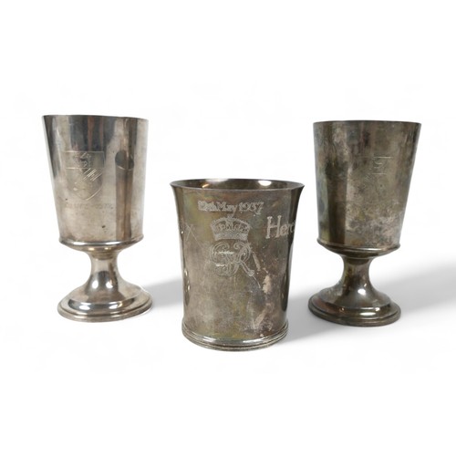 125 - A pair of silver gilt goblets, Birmingham marked BES Co for Barker Ellis Silver Co, each engraved to... 