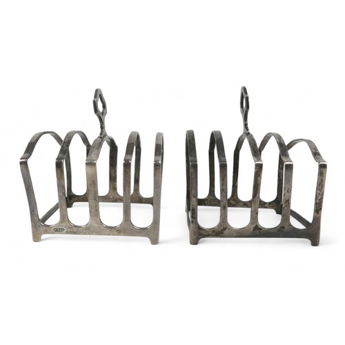 109 - A pair of silver toast racks, Birmingham 1928, stamped Wm Greenwood & Sons Leeds & Huddersfield, one... 