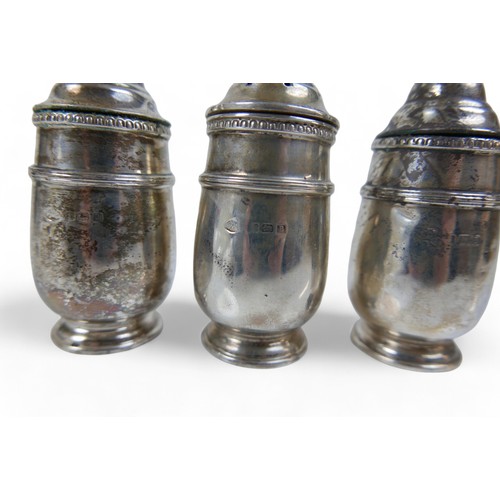 110 - A four piece silver cruet set, Birmingham 1926, Rd no. 655536, maker Adie Brothers Ltd, with egg and... 