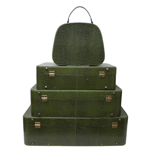 285 - Vintage Luggage; A set of four Pukka Luggage green faux crocodile leather effect suitcases (assorted... 