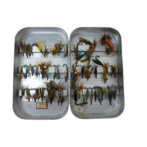 272 - Fishing: A vintage collection of fly fishing flies, lures, weight, hooks and other equipment in  Umc... 