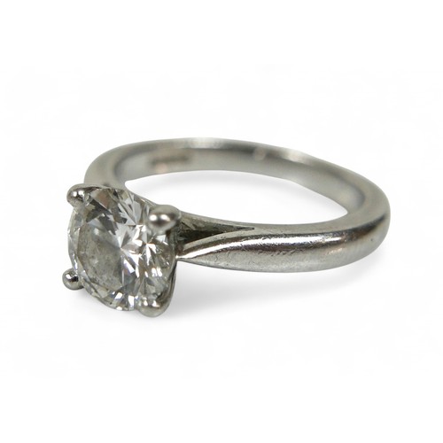 89 - A platinum diamond solitaire ring, the round brilliant cut stone 1.01ct with SI1 clarity, colour G, ... 