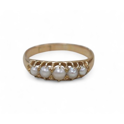 41 - An 18ct gold pearl ring, the largest of the five graduated pearls, 3mm diameter, smallest approximat... 