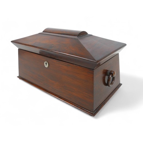 284 - A 19th century rosewood sarcophagus shaped tea caddy, 34 by 18 by 20cm high.