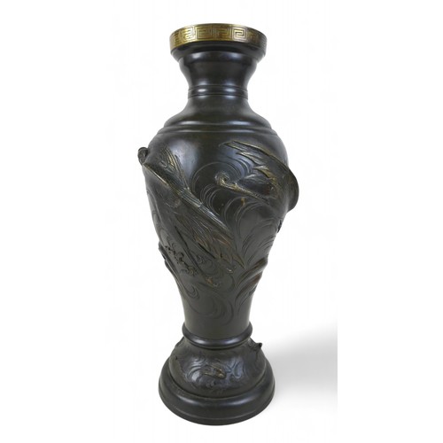 176 - A Japanese patinated bronze narrow-necked vase, circa 1900, relief moulded heron and bird design, 22... 