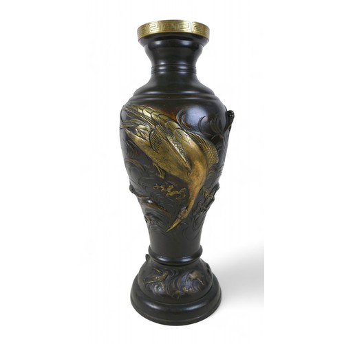 176 - A Japanese patinated bronze narrow-necked vase, circa 1900, relief moulded heron and bird design, 22... 