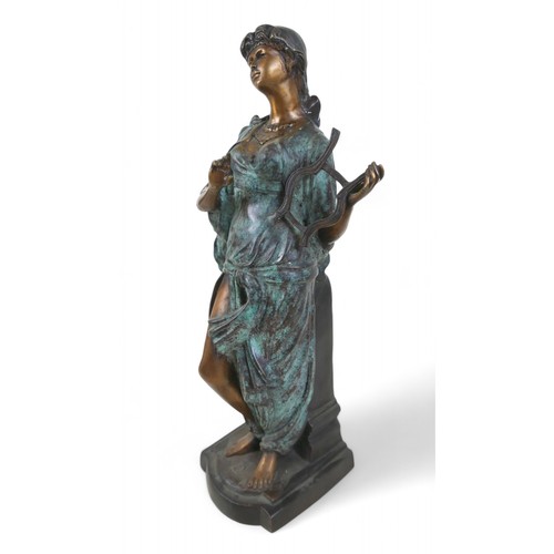 219 - A bronze classical figure playing a lyre, 14 by 16 by 53cm high.