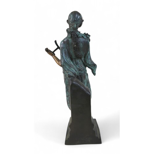 219 - A bronze classical figure playing a lyre, 14 by 16 by 53cm high.