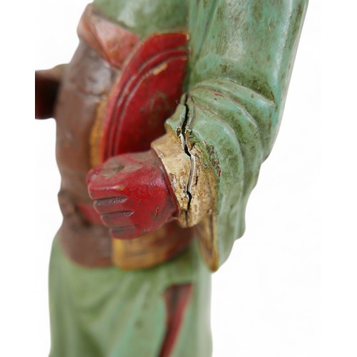 158 - A carved painted wooden figure, 15 by 13 by 47cm high.