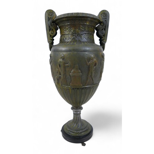 301 - A bronze effect classical style urn, 17 by 13 by 38cm.