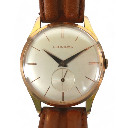 146 - A Leonidas gents manual wind gents wrist watch, on leather strap, 33mm case with secondary dial.