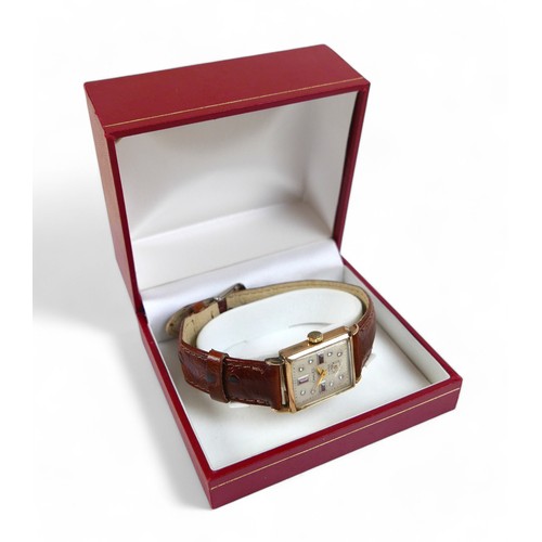 154 - A 14ct yellow gold Chalet wristwatch, with 21mm case, bejewelled dial and 17 jewel manual wind movem... 