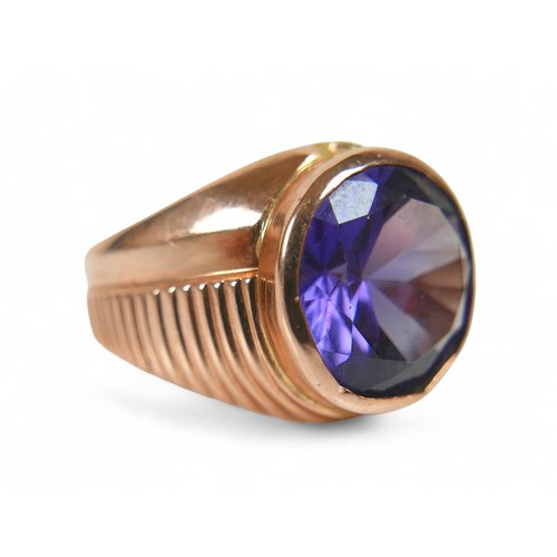 61 - An 18ct Egyptian yellow gold amethyst ring, size T, stone size approximately 12mm diameter by 7mm de... 