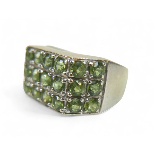 46 - A 9ct white gold green stone ring, size T, 10.3g.