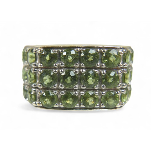 46 - A 9ct white gold green stone ring, size T, 10.3g.