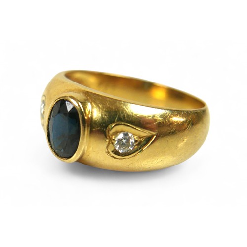 72 - An 18ct yellow gold diamond and sapphire three stone ring, size R, 7.1g.