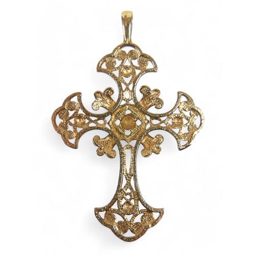 47 - A 9ct yellow gold pendant, of cross form, with scrolling open work design, 41 by 4 by 62mm, 9.0g.