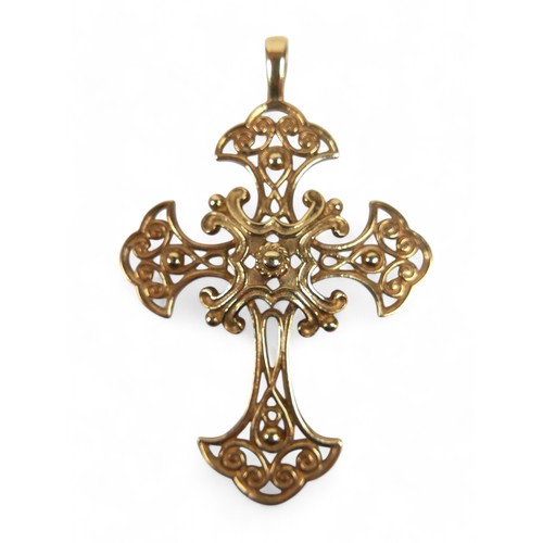 47 - A 9ct yellow gold pendant, of cross form, with scrolling open work design, 41 by 4 by 62mm, 9.0g.