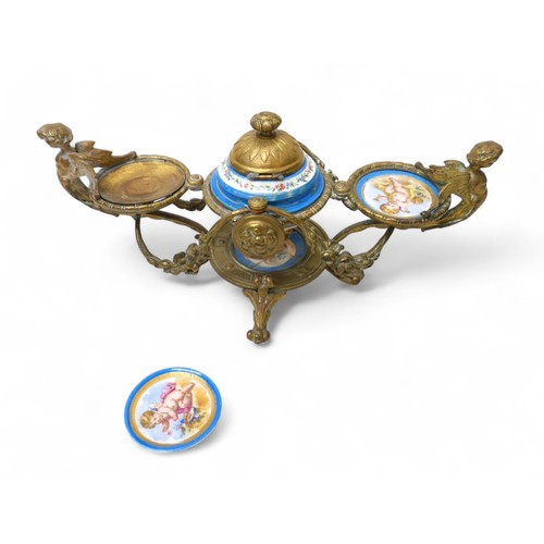 297 - A 19th century brass and porcelain desk inkstand, 29 by 15 by 15cm.