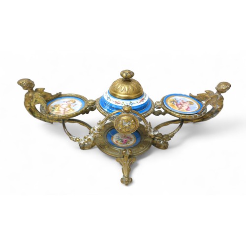 297 - A 19th century brass and porcelain desk inkstand, 29 by 15 by 15cm.