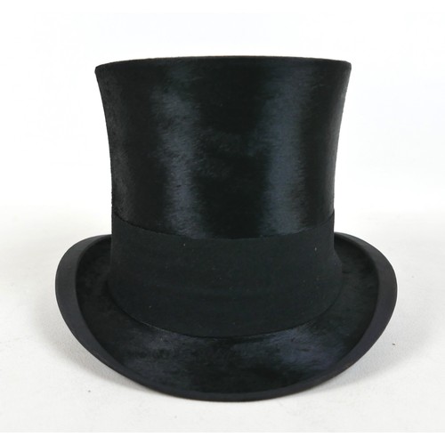 292 - An Edwardian silk top hat, internal measurement approx. 53cm, in a brown leather hat box.