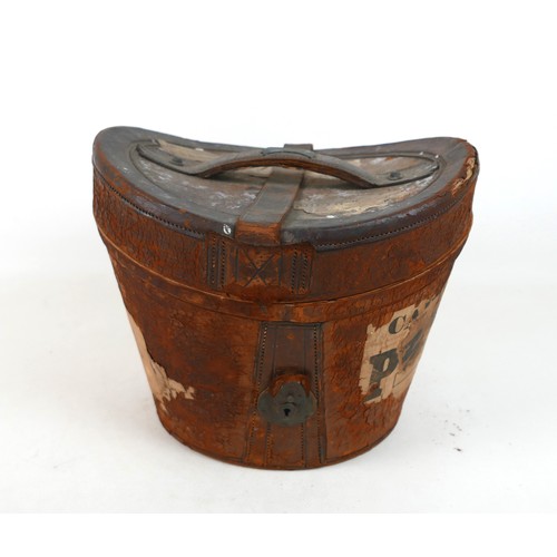 292 - An Edwardian silk top hat, internal measurement approx. 53cm, in a brown leather hat box.