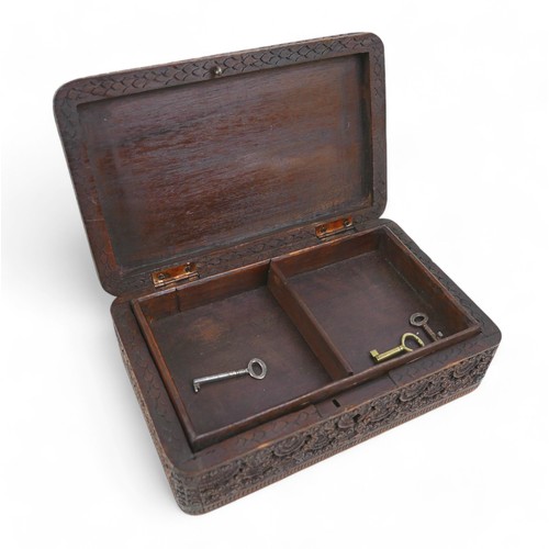 162 - An eastern carved wooden tobacco box and a jewellery box, box measures 20 by 12 by 7cm high.(2)