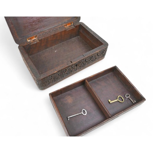 162 - An eastern carved wooden tobacco box and a jewellery box, box measures 20 by 12 by 7cm high.(2)