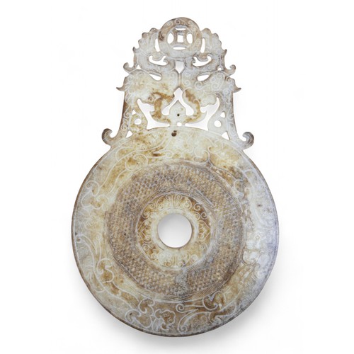 163 - An Oriental carved soap stone roundel, 20 by 0.5 by 31cm.