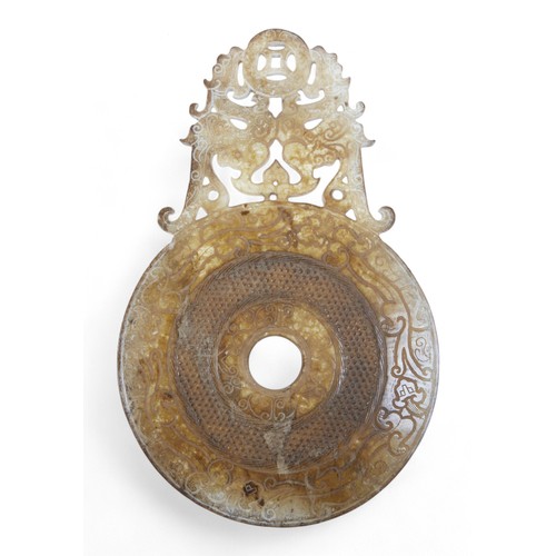 163 - An Oriental carved soap stone roundel, 20 by 0.5 by 31cm.