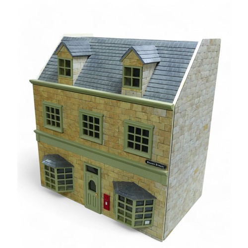 249 - A part scratch built dolls house 'No.12 Baker Street', 60.5 by 37 by 64cm high, with various furnitu... 