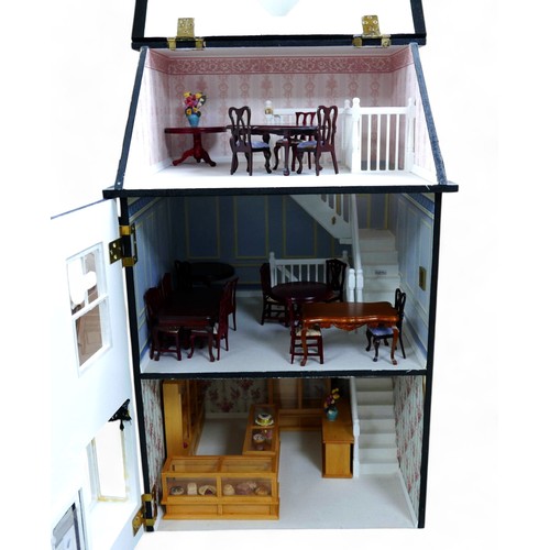 250 - A part scratch built three storey dolls house tea room, 41.5 by 38.5 by 77.5cm high, with furniture ... 