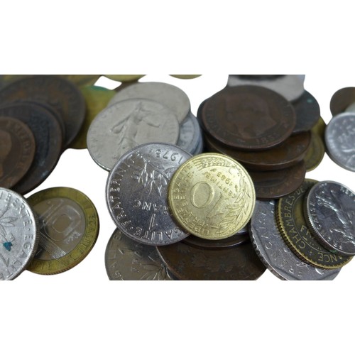 8 - A quantity of assorted world coinage, to include coins from America, Germany, Greece, Romania, Yugos... 