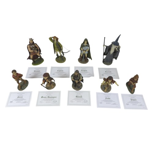 226 - A collection of nine Danbury Mint figurines, modelled as The Lord of the Rings characters, each boxe... 