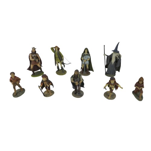 226 - A collection of nine Danbury Mint figurines, modelled as The Lord of the Rings characters, each boxe... 