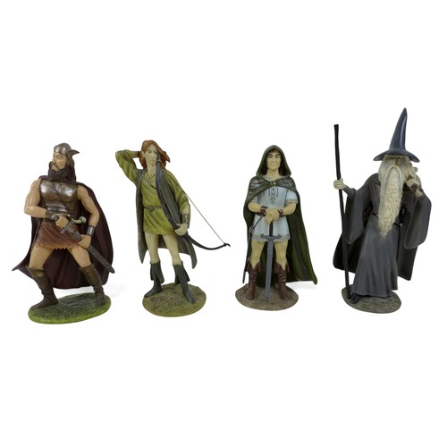 226 - A collection of nine Danbury Mint figurines, modelled as The Lord of the Rings characters, each boxe... 