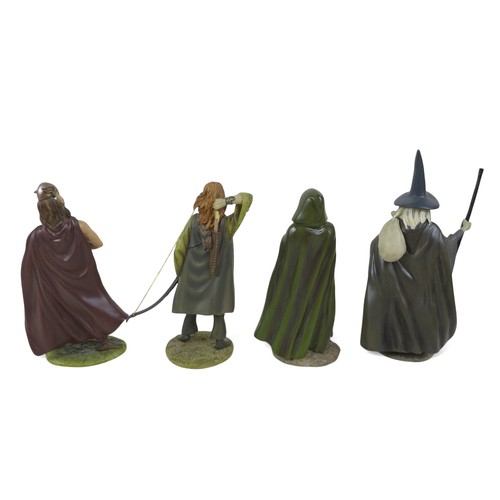 226 - A collection of nine Danbury Mint figurines, modelled as The Lord of the Rings characters, each boxe... 