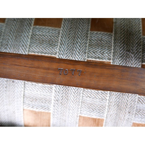 346 - A Victorian walnut X frame stool, with leather seat, stamped 7077, 47 by 35 by 46cm high.