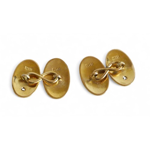 74 - A pair of 18ct gold and diamond oval cufflinks, engraved with initials PG,  each oval set with singl... 