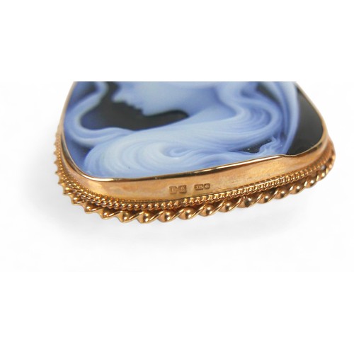 51 - A 9ct yellow gold blue agate cameo brooch, with pendant fitting 34 by 11 by 42mm, 14.0g.