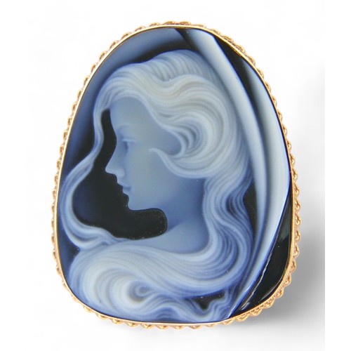 51 - A 9ct yellow gold blue agate cameo brooch, with pendant fitting 34 by 11 by 42mm, 14.0g.