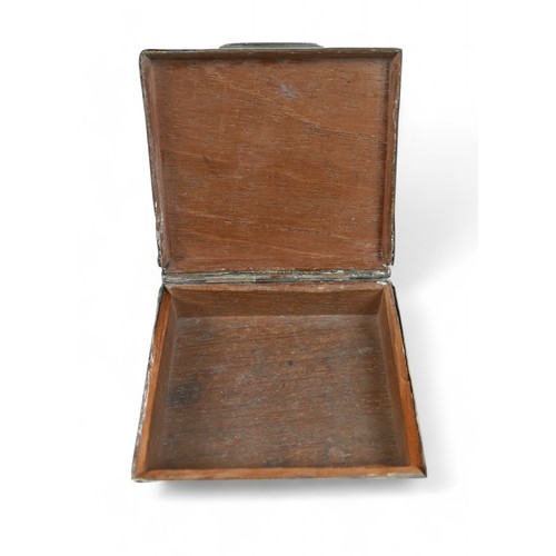 22 - A silver desk box and two small 19th century tortoiseshell boxes, largest 8.5 by 8 by 3cm.