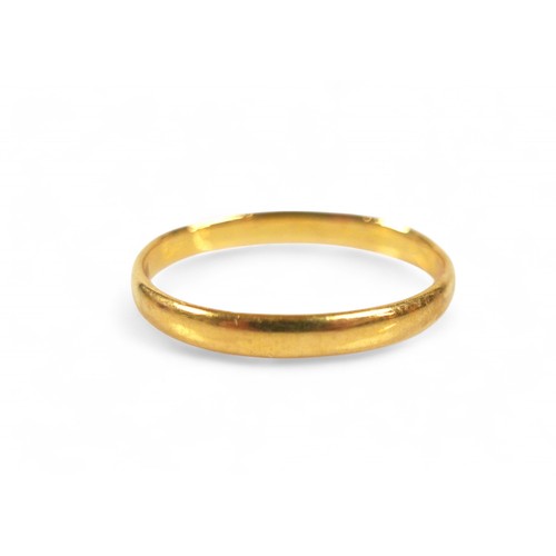 81 - A 22ct gold wedding band, slight bend in the band, size N, 2.2g, boxed.