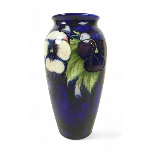 189 - A Moorcroft pansy vase, 12cm diameter by 26cm high.