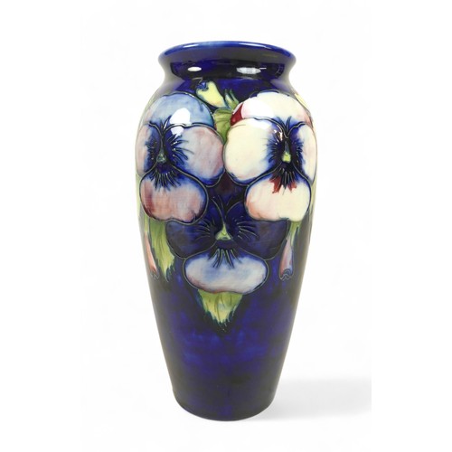 189 - A Moorcroft pansy vase, 12cm diameter by 26cm high.