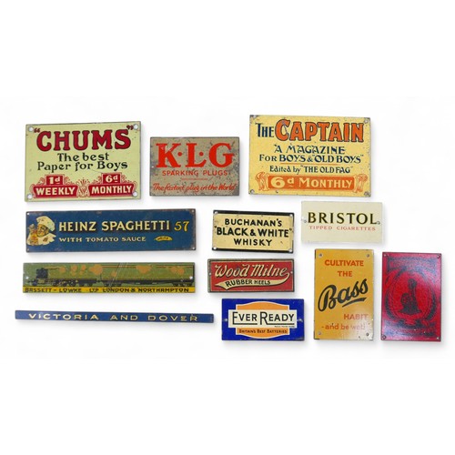 236 - Twelve Bassett-Lowke model railway tinplate advertising signs. (12)