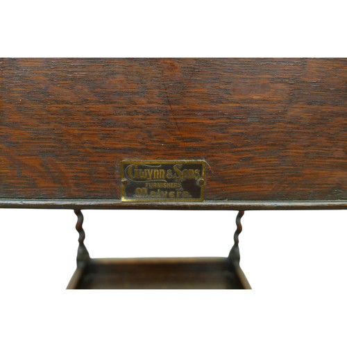 347 - An oak sewing box on barley twist legs, 36.5 by 36.5 by 63cm high.