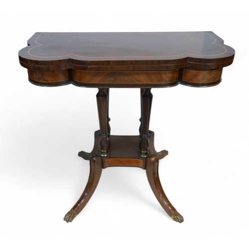 355 - A regency style mahogany card table, with a shaped folder top on a pillared platform base and out-sw... 