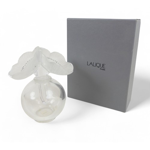 192 - A Lalique 'Anemone' glass scent bottle, etched mark Lalique France, 15 by 10 by 17cm high, with box.